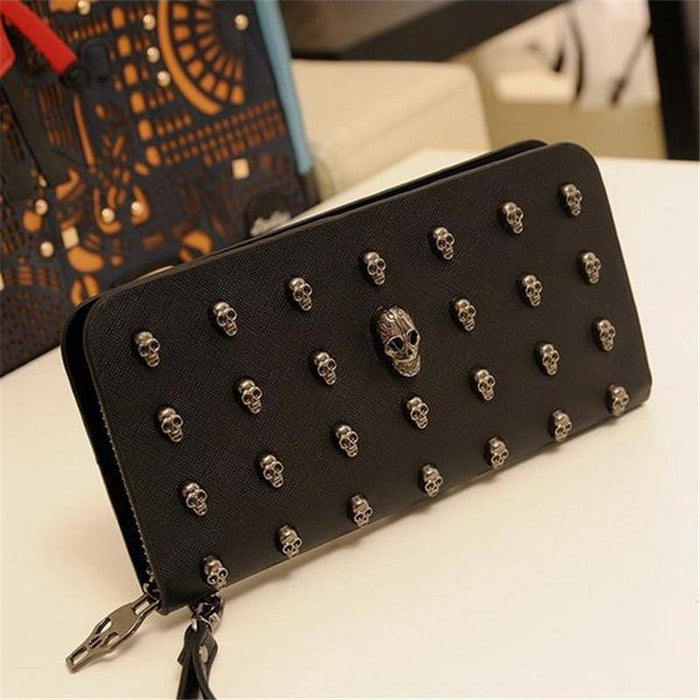Leather Wristlet Handbag with Metal Skull Design